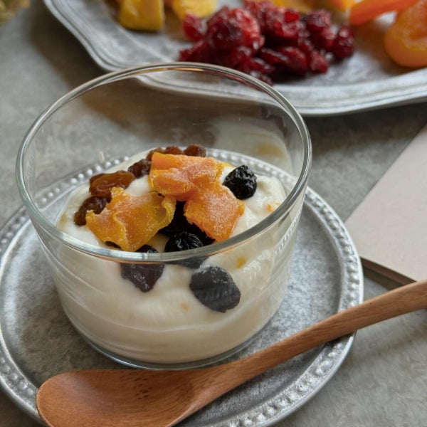 Breakfast with Yogurt Topped with Dried Fruit